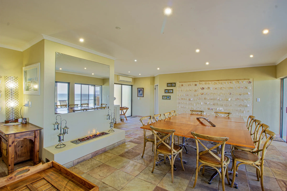 The dining room beside the gas fireplace