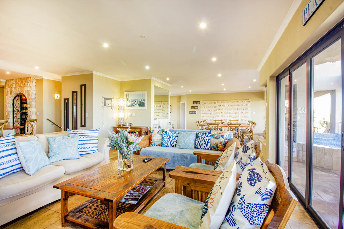 The open-plan lounge facing the sea-facing glass